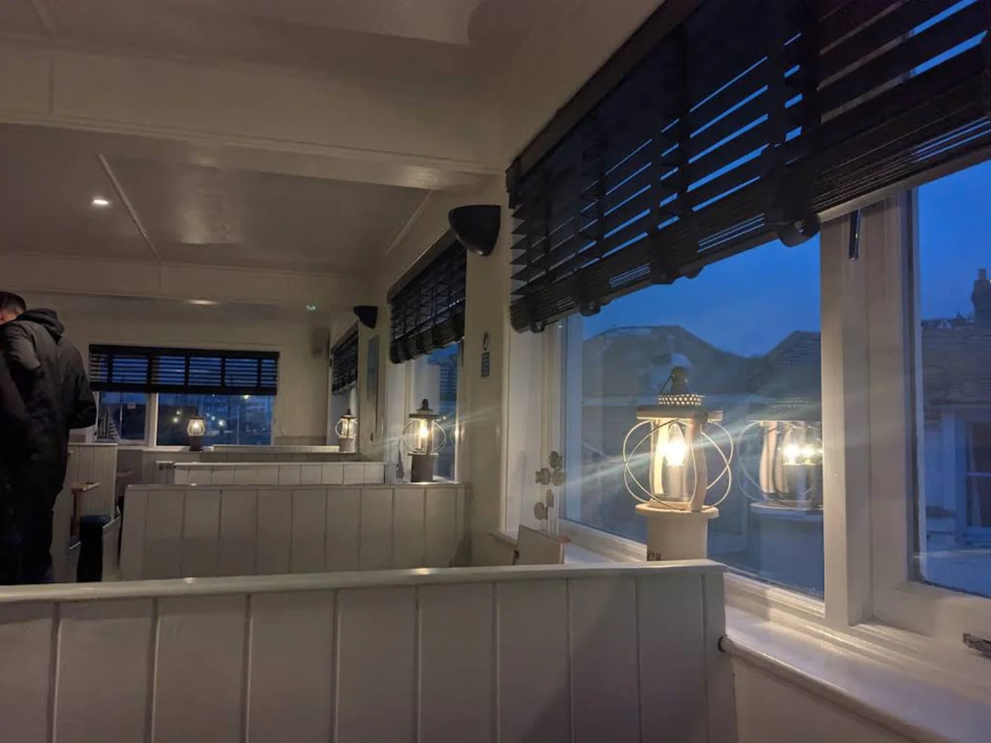 Warm lights in the upstairs restaurant in the evening